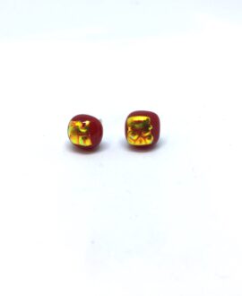 Deep red square stud featuring gold detail with a ripple effect on sterling silver posts