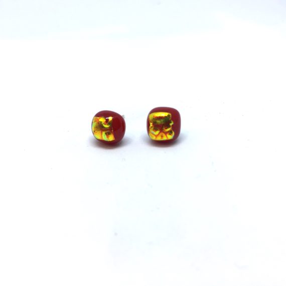 Deep red square stud featuring gold detail with a ripple effect on sterling silver posts