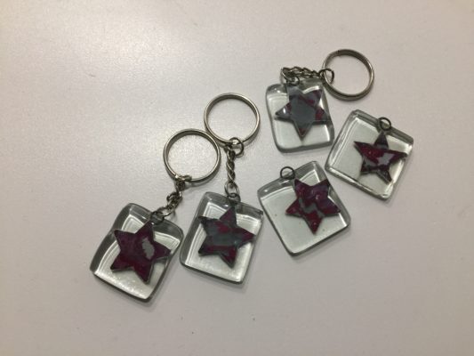 Copper stars fused in glass for keyrings