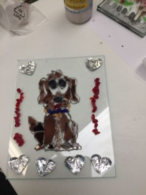 Chocolate labrador dog in glass