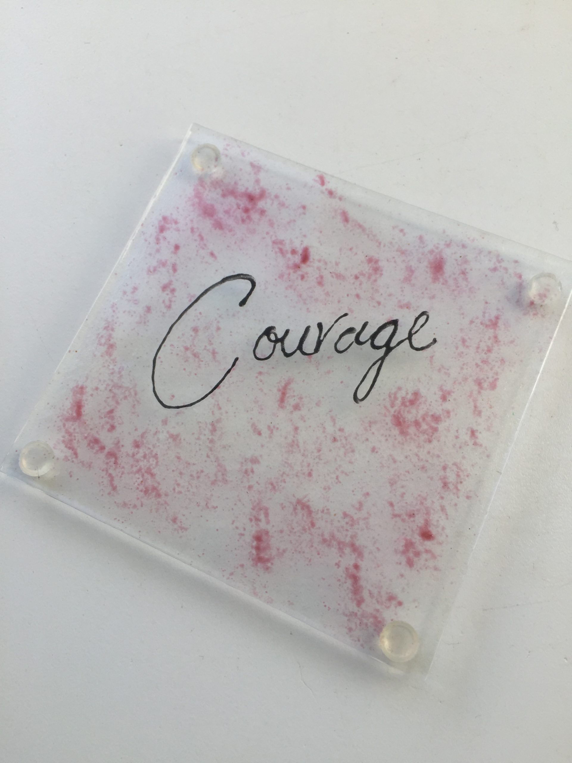 Fused glass coaster in pink with courage wording